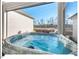 Enjoy the soothing jets of this outdoor hot tub while taking in the serene backyard view, enhancing your relaxation experience at 153 Abercorn Cir, Chapel Hill, NC 27516