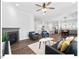 Open-concept living space showcasing a living room, kitchen, and dining area with modern finishes at 153 Abercorn Cir, Chapel Hill, NC 27516