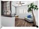 Bright and cozy office with comfortable seating, hardwood floors, and a lush potted plant, creating a productive workspace at 153 Abercorn Cir, Chapel Hill, NC 27516