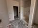Unfinished bathroom features a shower and an open doorway, offering potential for customization at 20 Trescott St, Smithfield, NC 27577