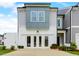 Charming new home exterior with a painted brick garage and complementary colored siding for a modern look at 2001 Regal Dr # 89, Durham, NC 27703