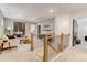 Cozy upstairs loft area with neutral walls and flooring featuring modern decor and lots of natural light at 2001 Regal Dr # 89, Durham, NC 27703