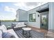 Outdoor patio features a modern sitting area with views, perfect for entertaining at 2002 Moody Ln, Durham, NC 27701