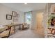 Bright bedroom with functional layout, two desks, and ample lighting at 2003 Regal Dr # 90, Durham, NC 27703