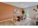 Elegant dining room with stylish decor, a wooden table, and modern lighting fixtures at 2003 Regal Dr # 90, Durham, NC 27703