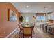 Elegant dining room with stylish decor, a wooden table, and modern lighting fixtures at 2003 Regal Dr # 90, Durham, NC 27703