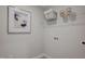 Bright laundry room with practical shelving and washer/dryer hookups at 2003 Regal Dr # 90, Durham, NC 27703
