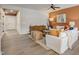 Inviting living room featuring wood floors, modern decor, and comfortable white sofas at 2003 Regal Dr # 90, Durham, NC 27703