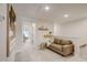 Inviting upstairs landing with soft carpet and a comfortable seating area at 2003 Regal Dr # 90, Durham, NC 27703