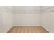 Walk-in closet with carpet flooring and wire shelving for optimal storage at 22 Black Creek Dr, Lillington, NC 27546