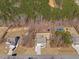 Spacious home on a private lot featuring a tennis court and trampoline for outdoor enjoyment at 2233 Kanata Mills Rd, Wake Forest, NC 27587