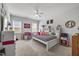Inviting bedroom with a ceiling fan and many windows at 2233 Kanata Mills Rd, Wake Forest, NC 27587