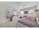 Bedroom featuring bright natural light, a ceiling fan, and carpet floors at 2233 Kanata Mills Rd, Wake Forest, NC 27587