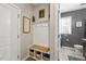 Functional entryway with storage bench and access to a half bathroom at 2233 Kanata Mills Rd, Wake Forest, NC 27587