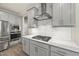 Modern kitchen boasting stainless steel appliances, granite countertops, and white subway tile backsplash at 2233 Kanata Mills Rd, Wake Forest, NC 27587