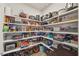Organized pantry with ample shelving for storage at 2233 Kanata Mills Rd, Wake Forest, NC 27587