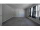 Neutral carpeted bedroom with natural light and window providing an airy feel at 2404 Pearces Rd, Zebulon, NC 27597