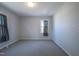 Bright bedroom with neutral walls, carpet and natural light at 2404 Pearces Rd, Zebulon, NC 27597