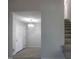 Entryway featuring stairs, chandelier, and access to other rooms and levels of the house at 2404 Pearces Rd, Zebulon, NC 27597