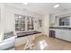 Bright kitchen with a breakfast nook, bench seating, and plenty of natural light at 2409 Keith Dr, Raleigh, NC 27610