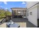 Relax on the covered patio with comfortable seating and a view of the large backyard at 2632 Jordan Pointe Blvd, New Hill, NC 27562
