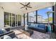 Relax on the covered patio with comfortable seating and views of the backyard at 2632 Jordan Pointe Blvd, New Hill, NC 27562