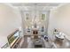 Spacious living room with soaring ceilings, fireplace, chandelier, and a view to the deck at 2632 Jordan Pointe Blvd, New Hill, NC 27562