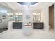 Stunning main bathroom featuring marble floors, a soaking tub, double vanities, and a frameless glass shower at 2632 Jordan Pointe Blvd, New Hill, NC 27562