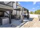 Outdoor patio area with stylish pergola, dining set, and ambient lighting, perfect for gatherings at 2632 Jordan Pointe Blvd, New Hill, NC 27562