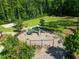 A clean and safe community playground featuring swings, slides, and play equipment at 2632 Jordan Pointe Blvd, New Hill, NC 27562
