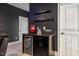 Home theater snack bar with a snack bar sign, mini fridge and storage for all your favorite movie snacks at 2632 Jordan Pointe Blvd, New Hill, NC 27562