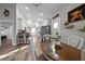 Inviting dining area with hardwood floors and views into the Kitchen and Living spaces at 310 Chub Lake St, Roxboro, NC 27573