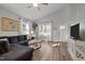 Bright living room with vaulted ceiling, ceiling fan, neutral walls, and lots of natural light at 310 Chub Lake St, Roxboro, NC 27573