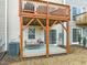 Cozy outdoor deck with a seating area, perfect for relaxing and enjoying the backyard view at 368 Amber Acorn Ave, Raleigh, NC 27603