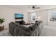 Living room with large sectional sofa and entertainment center at 368 Amber Acorn Ave, Raleigh, NC 27603