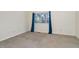 Bedroom has carpet and one window with blue drapes at 3775 Guess Rd # 36, Durham, NC 27705