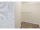 Walk-in closet features ample shelving and neutral carpeting at 3775 Guess Rd # 36, Durham, NC 27705