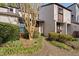 Charming townhouse showcasing beautiful landscaping and a welcoming entrance at 3775 Guess Rd # 36, Durham, NC 27705