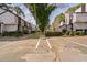 Exterior street view with visible condo numbers; assigned parking in the community at 3775 Guess Rd # 36, Durham, NC 27705