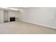 Bright living room features a fireplace with black screen and shelving at 3775 Guess Rd # 36, Durham, NC 27705