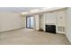 Spacious living room with fireplace, built-in shelves and sliding glass door at 3775 Guess Rd # 36, Durham, NC 27705