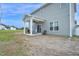 Backyard patio with grill, seating, and ceiling fan at 380 Grameta Ln, Lillington, NC 27546