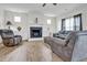 Spacious living room with fireplace, hardwood floors and recessed lighting at 380 Grameta Ln, Lillington, NC 27546