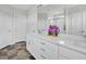 This main bathroom features double sinks, lots of counter space, and a large vanity mirror at 380 Grameta Ln, Lillington, NC 27546
