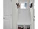 This mudroom provides ample space for shoe and coat storage, and a transom window at 380 Grameta Ln, Lillington, NC 27546