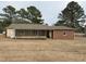 View of the backyard and screened in porch at 3901 Carson Dr, Sanford, NC 27332