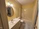 Bathroom complete with a bathtub/shower and a vanity that has an oval mirror at 3901 Carson Dr, Sanford, NC 27332