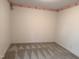 Spacious, carpeted bedroom with wall decor and ample natural light from the window at 3901 Carson Dr, Sanford, NC 27332