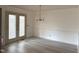 Bright dining room featuring modern flooring, stylish lighting fixture and natural light at 3901 Carson Dr, Sanford, NC 27332