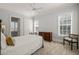 Light-filled bedroom with neutral walls, carpet, and furniture at 40 Park Meadow Ln, Youngsville, NC 27596
